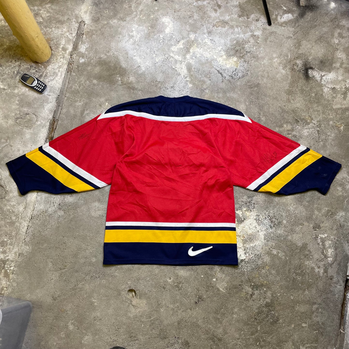 2003 Autographed World Junior Hockey jersey (S)