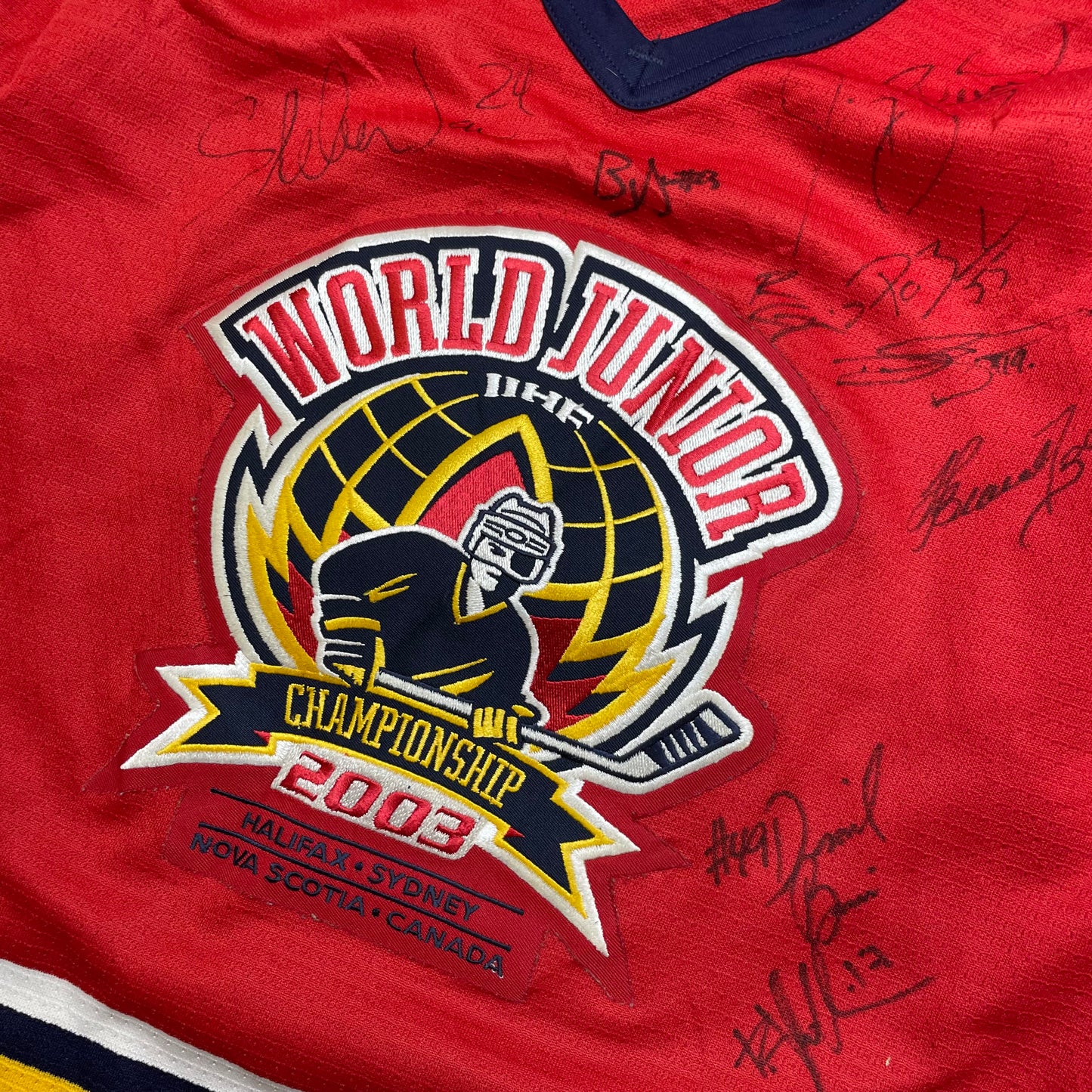 2003 Autographed World Junior Hockey jersey (S)