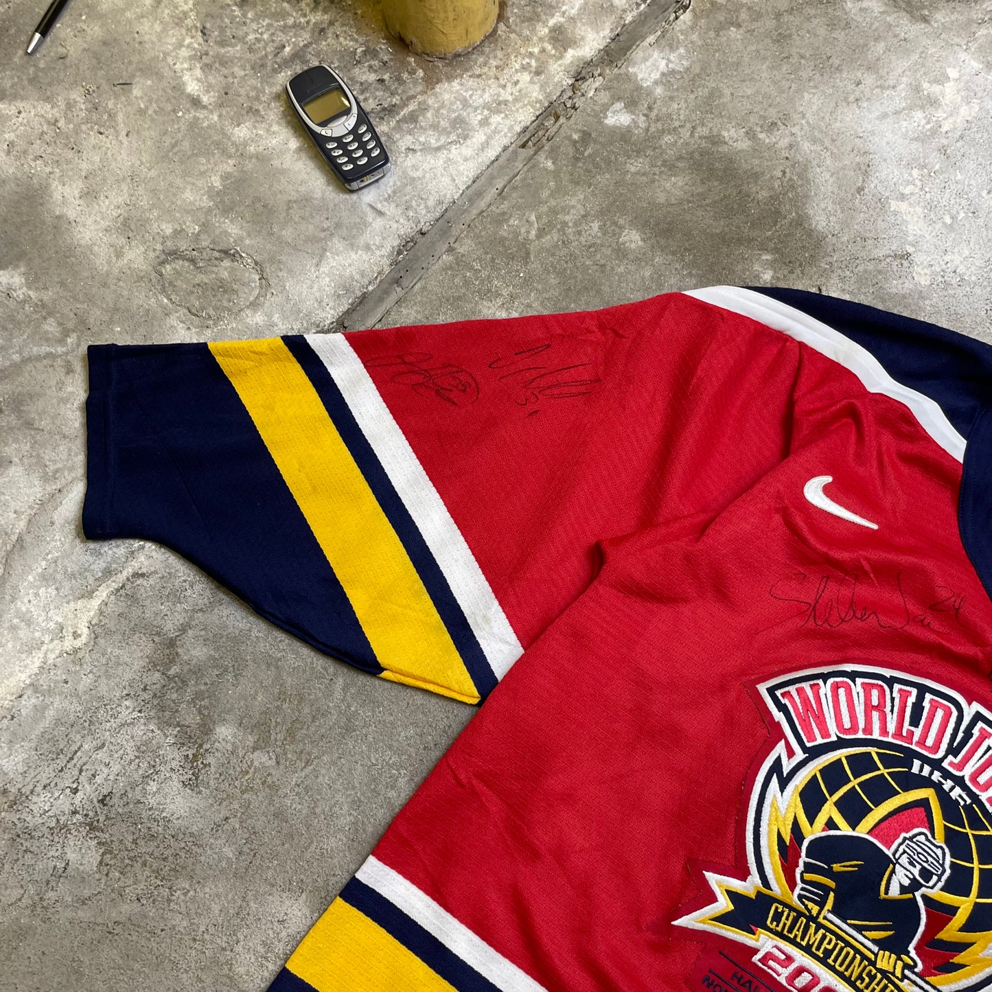 2003 Autographed World Junior Hockey jersey (S)