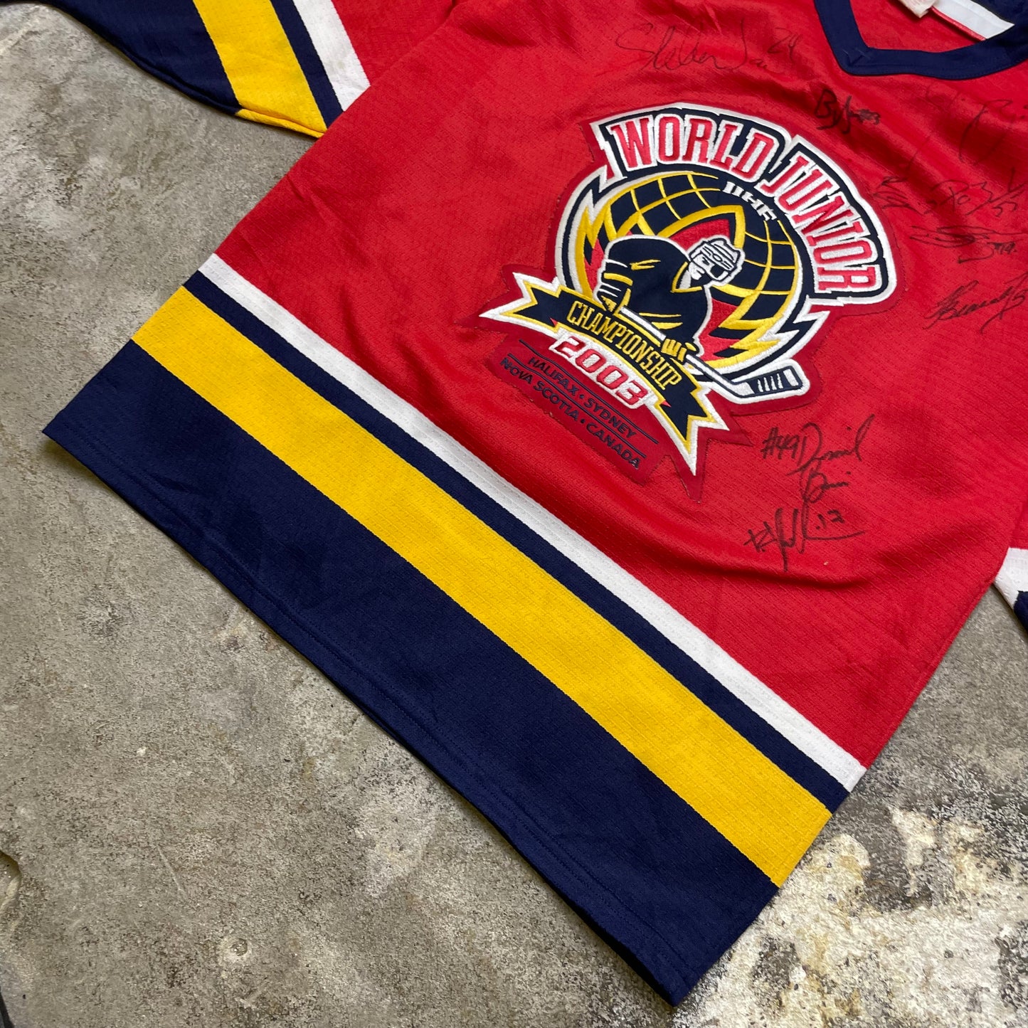 2003 Autographed World Junior Hockey jersey (S)